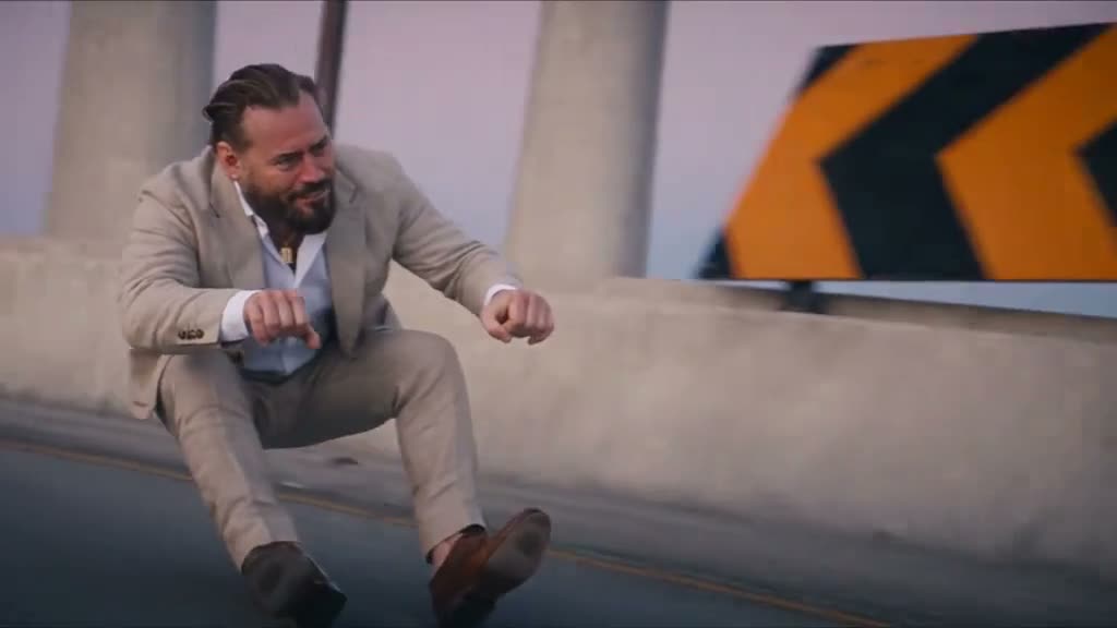 Crazy Frog AI invisible-moped rider crouching on a concrete overpass